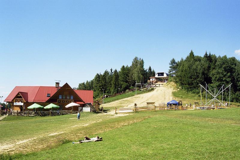 Reklama na budynku w wypoczynkowej miejscowosci, Szczawnica, małopolskie