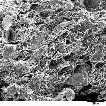 Intencjonalny dodatek składników mineralnych w materiale organicznym (substancja kompozytowa).