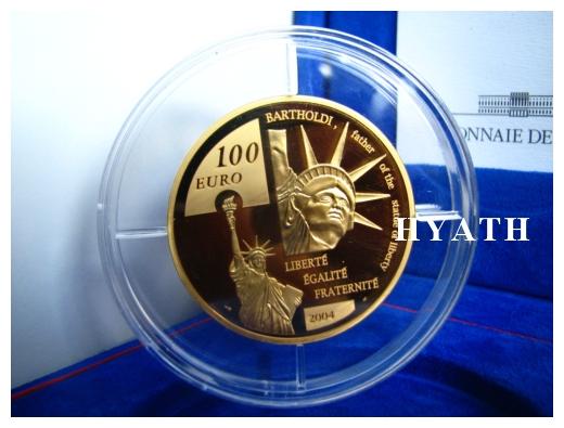 Moneta złota : 100 euro F.A..Bartholdi 2004 - więcej szczegółów : www.hyath.pl