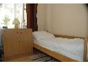 Renesans Hostel - łóżko w pokoju dwuosobowym
