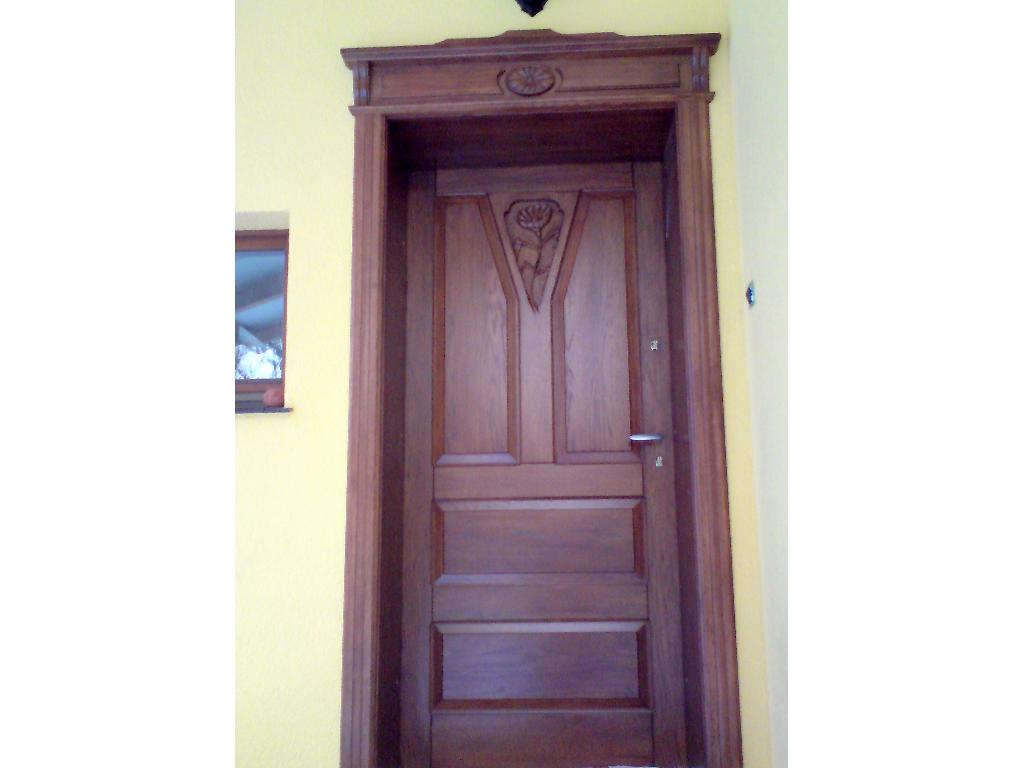 drzwi wejściowe dębowe z elementami ręcznie rzeźbionymi