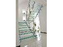 schody szklane na konstrukcji dwubelkowej lakierowanej prosz